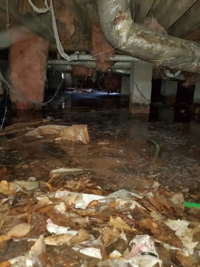 Crawl space flood assessment for Commercial Water Damage Restoration in Amityville